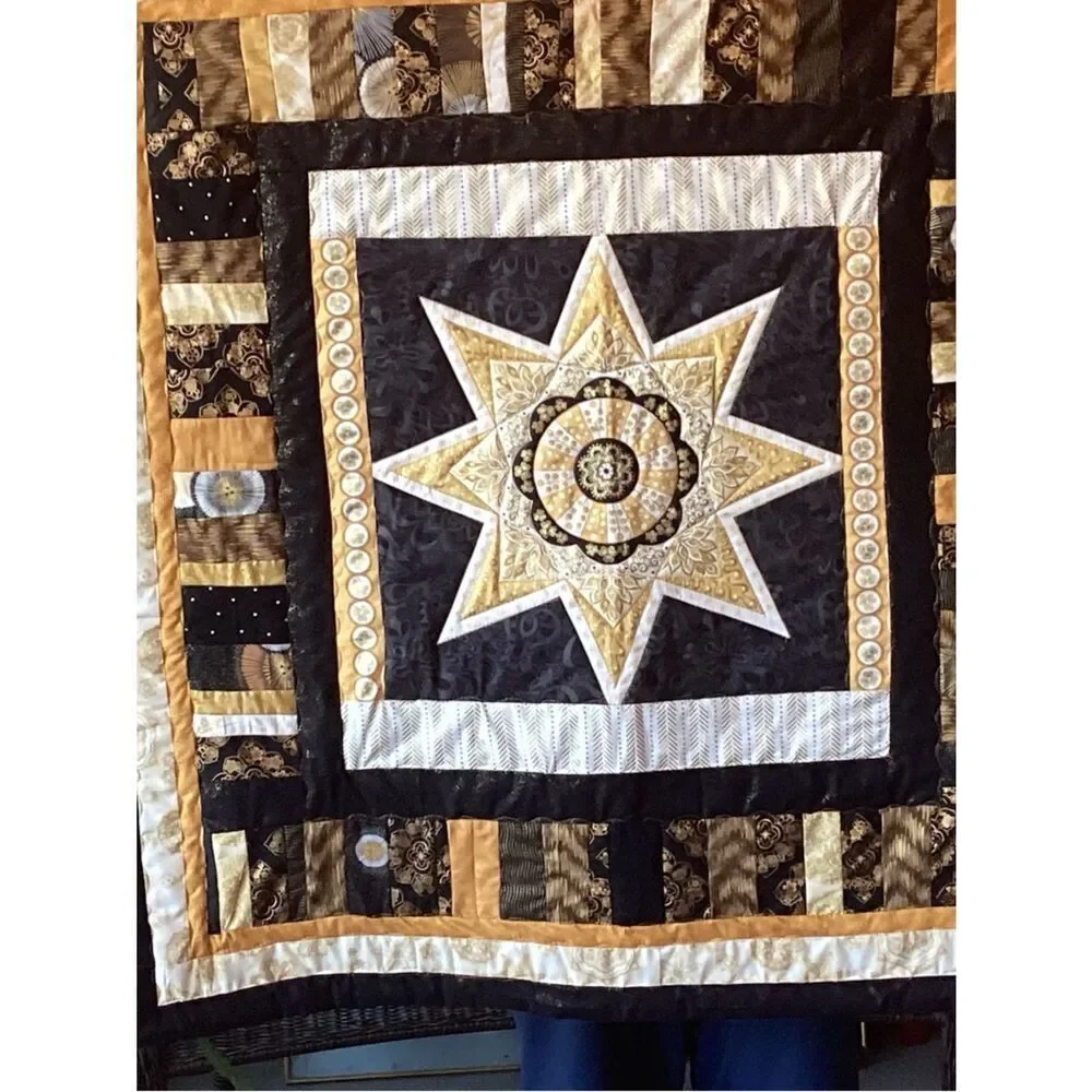 NWT. Gold and Black Star Lap Quilt